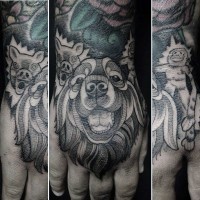 Tribal style black ink various animals tattoo on hand