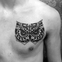 Tribal style owl's head original tattoo on chest