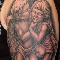 Two cherubs kneeling tattoo on arm