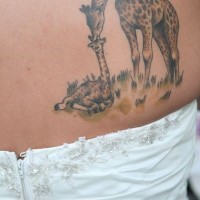 Tatuaje  de dos jirafas tiernas