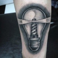 Typical black and white forearm tattoo of bulb with lighthouse