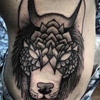 Typical black and white side tattoo of mystical wolf
