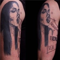 Typical black ink forearm tattoo of woman portrait with lettering