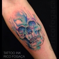 Typical colored forearm tattoo of small skull