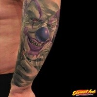 Typical illustrative style hand tattoo of evil clown