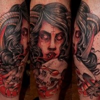 Typical old school style colored devil woman with human skull tattoo