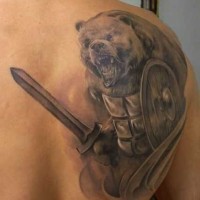 Unbelievable black and white shoulder tattoo of big bear with armor, shield and sword