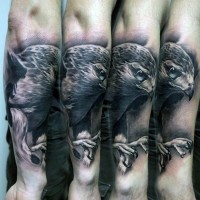 Unbelievable black ink forearm tattoo of flying eagle