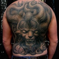 Unbelievable detailed 3D like massive whole back tattoo of evil evils face with horns