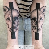 Unbelievable symmetrical painted by Valentin Hirsch forearm tattoo of fox and human skull