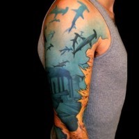 Under sea with hammerhead sharks tattoo on half sleeve