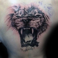 Unfinished black ink tattoo of roaring lion