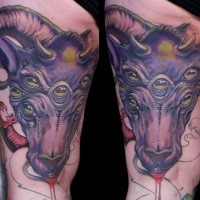 Unfinished colorful demonic bloody goat head tattoo on thigh with snakes