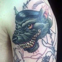 Unfinished funny looking shoulder tattoo of werewolf in suit