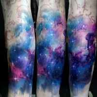 Unfinished homemade like colored space tattoo on leg