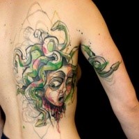 Unfinished new school style colored back tattoo of Medusa head