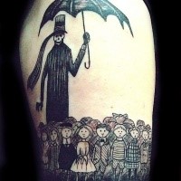 Unique black and white shoulder tattoo of lots of kinds and creepy man with umbrella