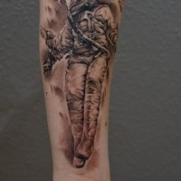 Unique black ink astronaut tattoo of forearm with pigeons