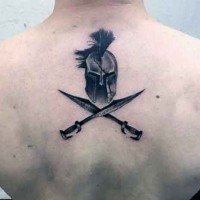 Unique black ink upper back tattoo of Spartan warrior helmet and crossed swords
