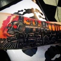 Unique deigned creepy demonic train tattoo on arm