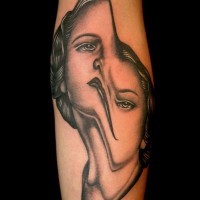 Unique designed and painted black and white corrupted woman portrait tattoo on arm