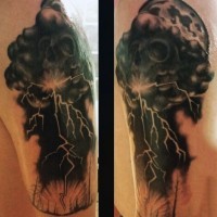 Unique designed black and white skull shaped storm cloud with lightning tattoo on arm