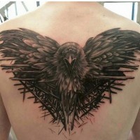 Unique massive black ink detailed upper back tattoo of fantasy crow