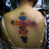Unique multicolored big cross shaped on back tattoo of flowers