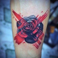 Unique style painted flower with red cross tattoo on leg