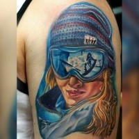 New school style colored shoulder tattoo of snowboarder woman