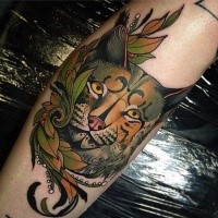New school style colored leg tattoo of caracal with leaves and jewelry