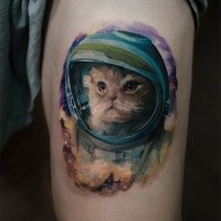 Illustrative style colored arm tattoo of cat astronaut