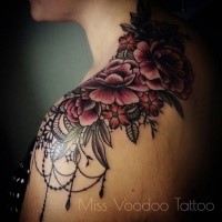 New school style colored shoulder tattoo of flowers by Caro Voodoo