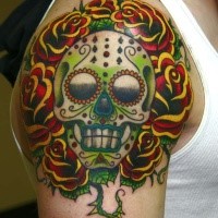 Illustrative style colored shoulder tattoo of Mexican style skull with roses