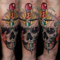 New school style colored forearm tattoo of human skull stylized with dagger