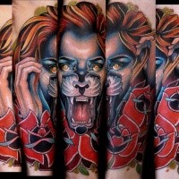 New school style colored arm tattoo of woman with lion face and flowers