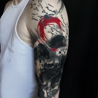New school style colored shoulder tattoo of human skull part and lettering