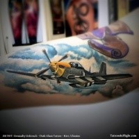 New school style colored arm tattoo of very detailed WW2 fighter plane