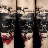 New school style colored arm tattoo of skull photo with lettering