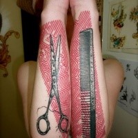 New school style colored arm tattoo of scissors with hair brush and ornaments