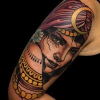 New school style colored shoulder tattoo of incredible woman face