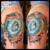 New school style colored shoulder tattoo of donuts with lettering