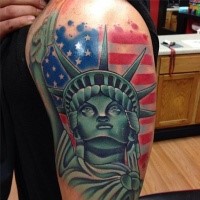 Illustrative style colored shoulder tattoo of Statue of Liberty
