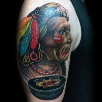 Illustrative style colored shoulder tattoo of old Indian face with hokey puck