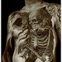Unusual black and white human skeleton tattoo on whole chest