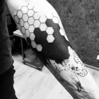 Unusual black ink forearm tattoo of geometrical figure with flying eagle