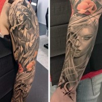 Unusual combined black and white angel statue and demonic woman portrait tattoo with colored wildflowers