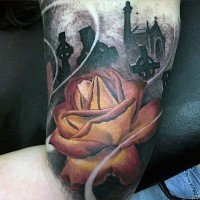 Unusual combined colored rose flower on dark cemetery arm tattoo