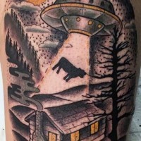 Unusual designed and colored alien ship with cow shoulder tattoo