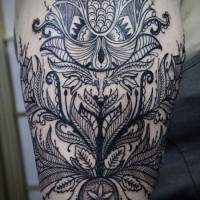 Unusual designed black and white shoulder tattoo of various floral ornaments